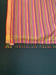 Kikoi Strandtuch orange and bright multicolor stripes with orange frame and pink towel